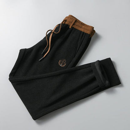Troy | Herren Cord-Sweatpants – Slim Taper – weicher Baumwollcord – Rippbund & Logo-Detail Hirschfeld Schwarz XS 